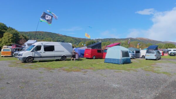 VW campervans at Busfest 2025 with Malvern Hills backdrop