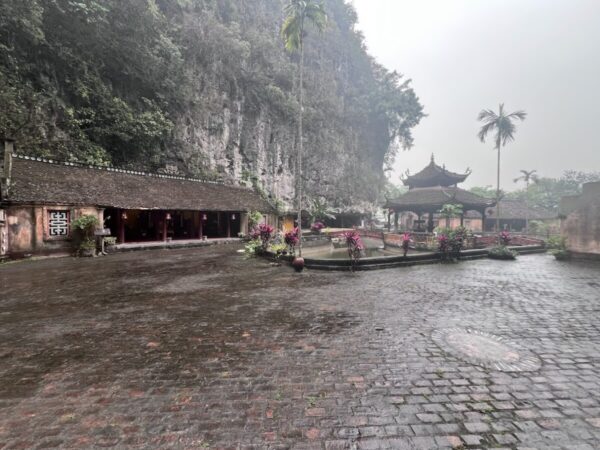 Temple courtyard in Tam Coc during a backpacking adventure