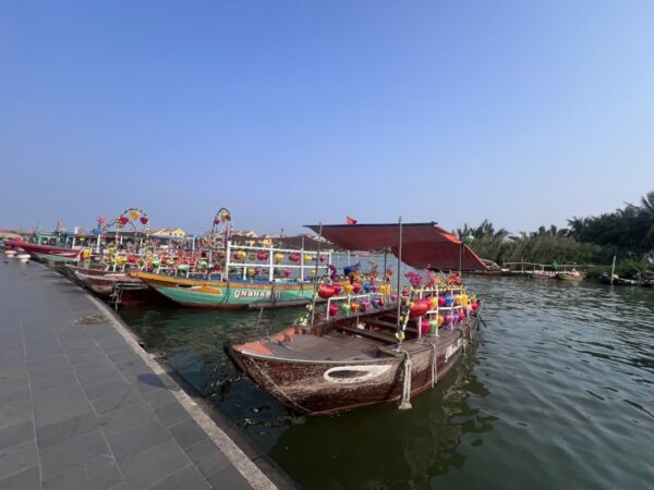 Lantern boats on the river in Hoi An at sunset