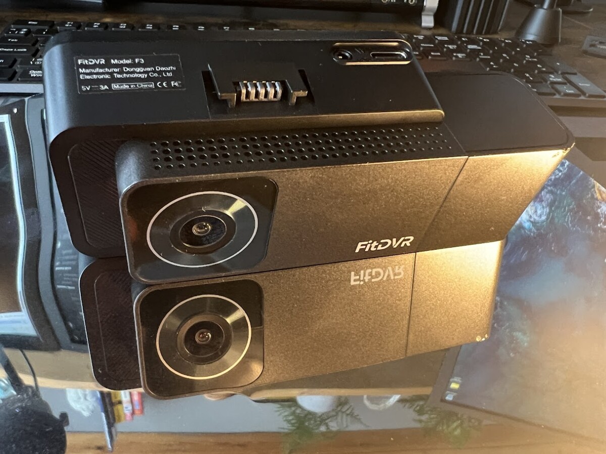FitDVR F3 dash cam front and cabin cameras on desk